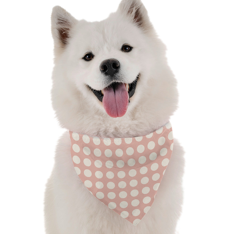 Triangular dog bandana in pink with white polka dots