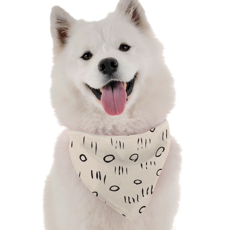 Peri white stuffed dog with open mouth, black nose, and graphic bandana