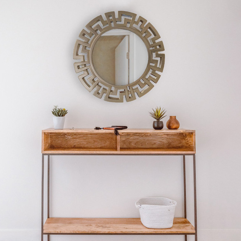 Round accent wall mirror with Bronze Greek-key style frame and visible round glass