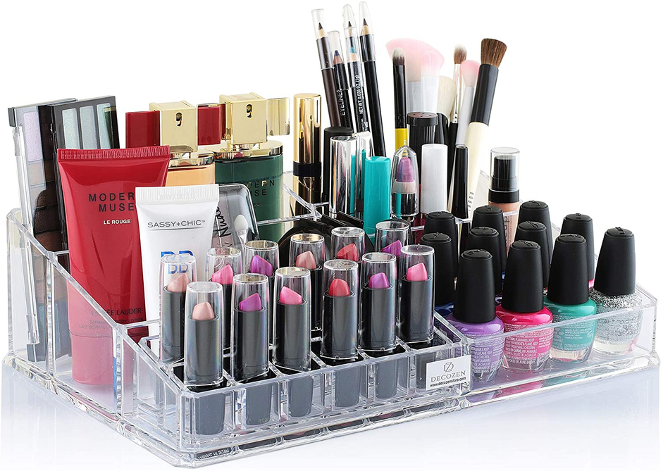 Clear acrylic makeup organizer with multiple lipstick holders and cosmetic compartments, front view