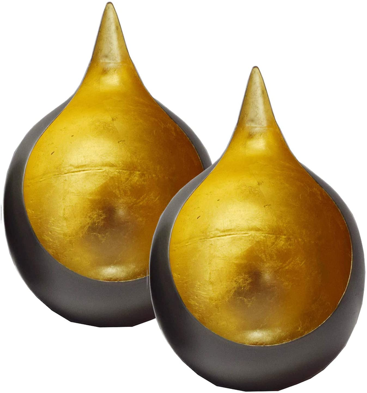 Two gold teardrop tea-light candle holders with dark outer bases, angled view
