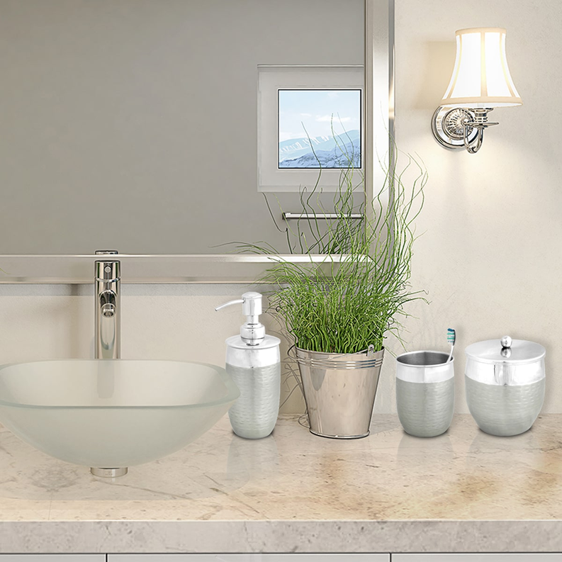 Brushed metal bathroom accessory set with soap dispenser, cups, and lidded canisters