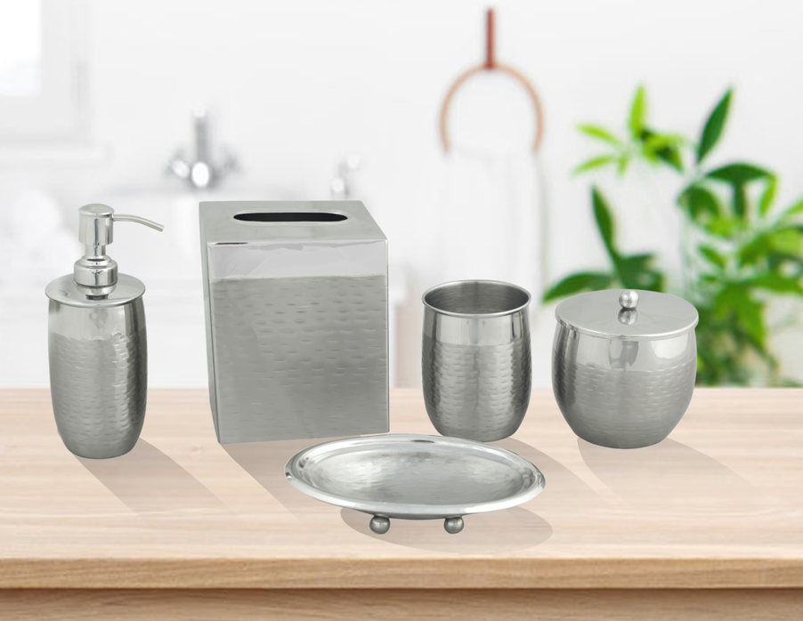 Brushed metal bathroom accessory set: tissue box, soap dispenser, cups, lidded canister, tray