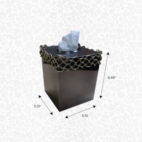 Tissue box cover with dark finish, gold lattice trim around top, holding blue tissues.
