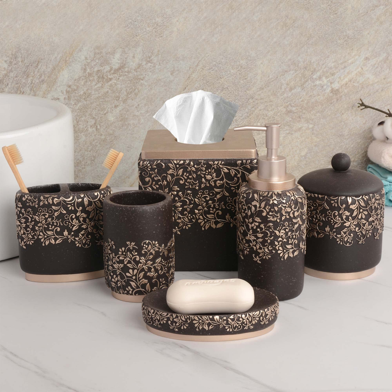 Black-and-gold floral bathroom accessory set with multiple ceramic containers and soap dish