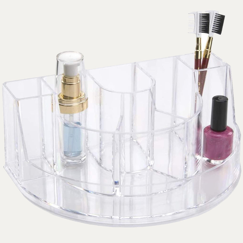 Clear 7-slot makeup organizer with compartment dividers and bottles with caps