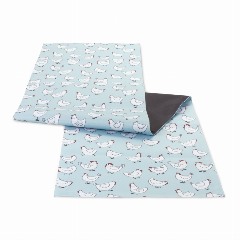 Polyester table runner, folded layers featuring light blue chicken pattern and dark reverse