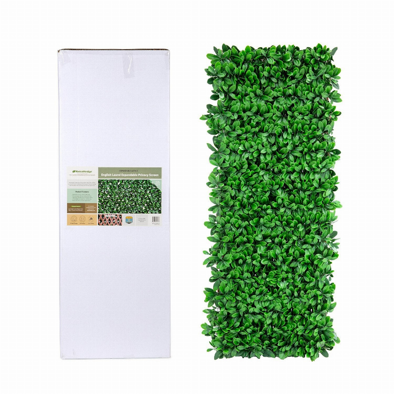 Packaged green faux privacy fence panel with white backing sleeve