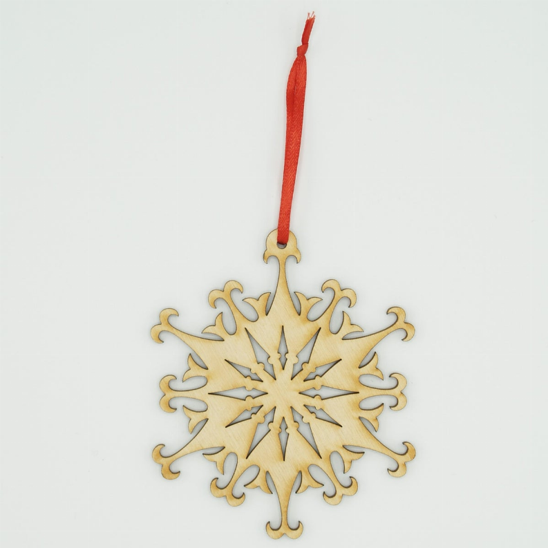 Gold ornate star tree ornament with red hanging ribbon, intricate snowflake-style cutout