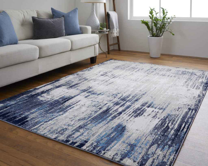 2' x 3' Blue and Ivory Abstract Power Loom Distressed Area Rug