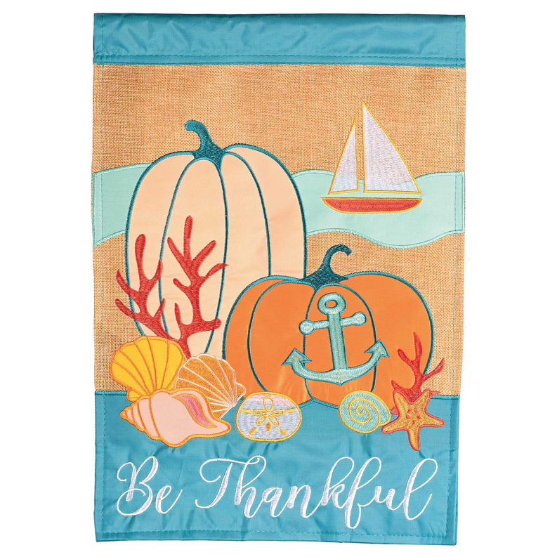 Coastal be thankful garden flag with blue trim, anchor, shells, and sailboat