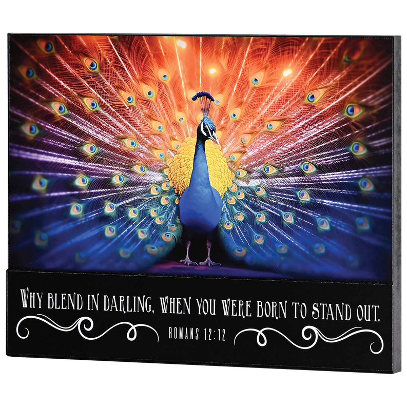 Peacock wall plaque featuring central bird, radiant fan feathers, and scripture quote strip