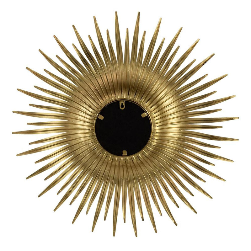 Gold sunburst accent mirror with dark round glass center and radiating iron spikes