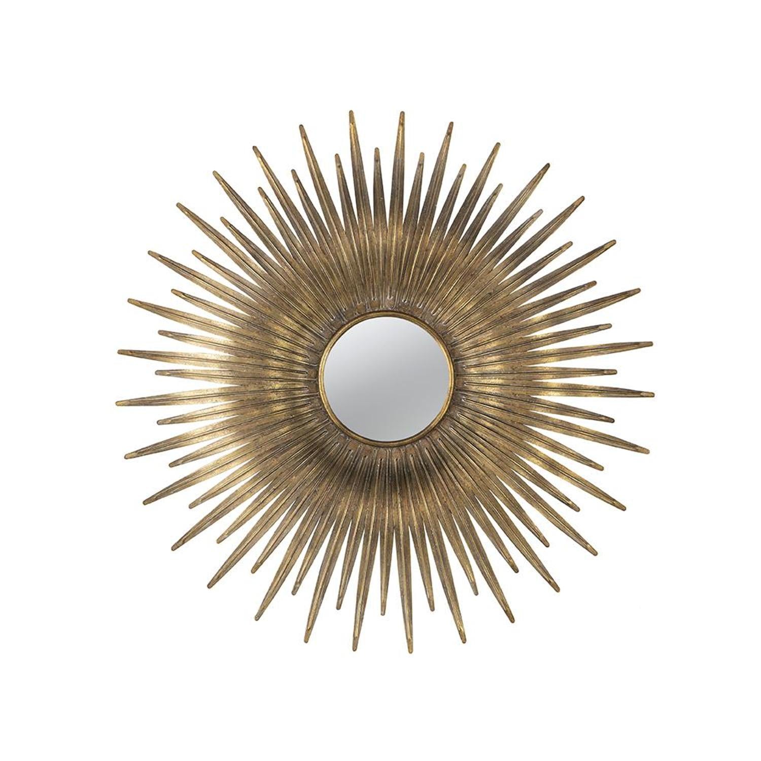 Gold sunburst accent mirror with bright round glass center and radiating iron spikes