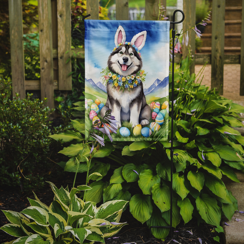 Alaskan Malamute Easter egg hunt garden flag displayed on garden stakes