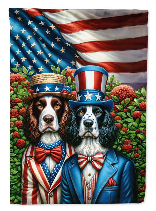Garden flag close-up of two Springer Spaniels wearing top hats, bows, and patriotic outfits