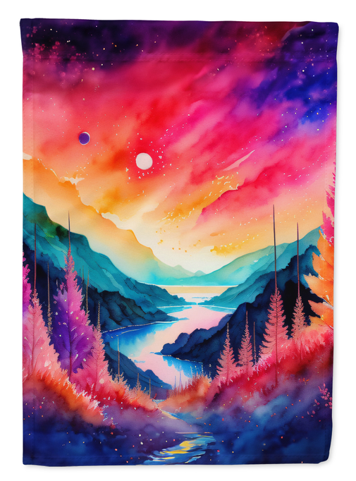 Colorful galaxy landscape garden flag with glowing sky, stars, and pine silhouettes