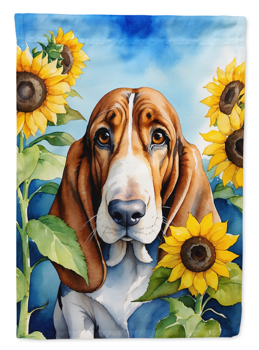 Basset hound garden flag with front-facing dog, yellow sunflowers, and blue sky