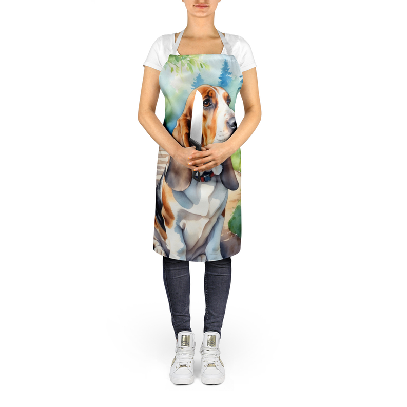 Basset hound garden print apron on model, front bib with long tie straps