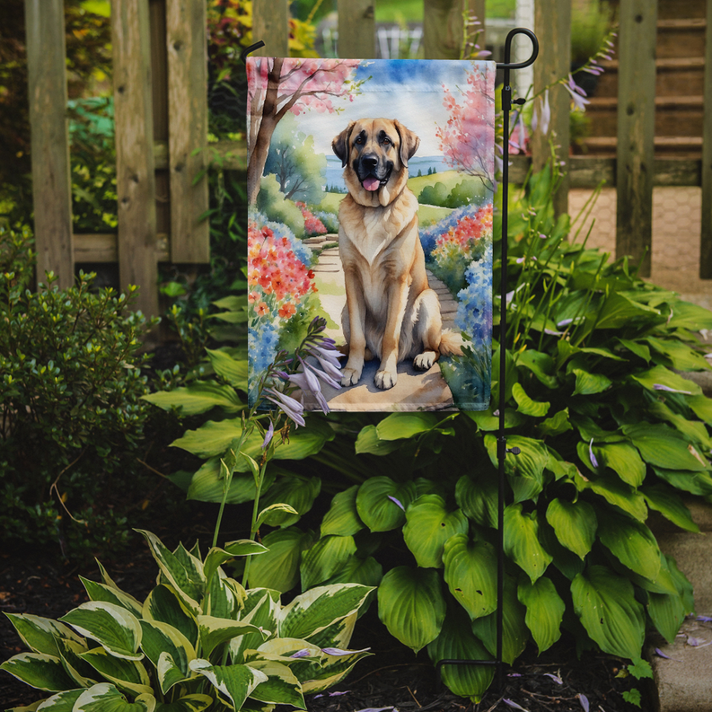 Garden flag with tan-and-black dog portrait hanging on metal garden stake
