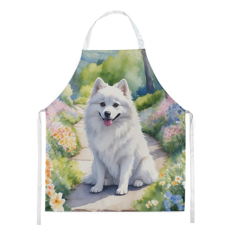 Garden apron with white neck strap and colorful flower path scene featuring a white dog
