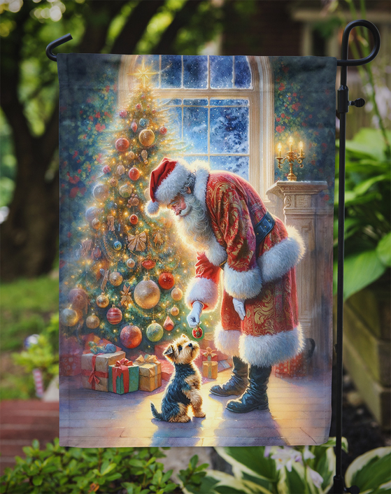 Christmas garden flag with Santa-costumed dog and tree by window scene