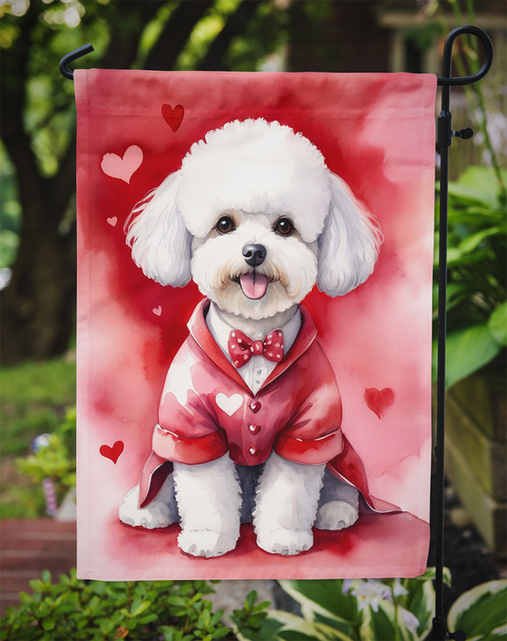 Red heart-pattern garden flag with white bichon frise in red vest, bow tie, and hearts