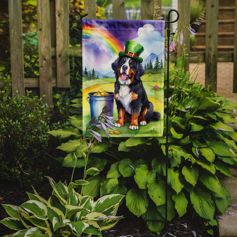 Garden flag featuring Bernese mountain dog with rainbow and gold pot on stand