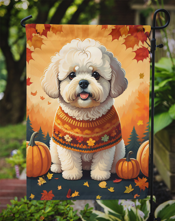 Autumn garden flag featuring white bichon frise with orange sweater, pumpkins, and leaves