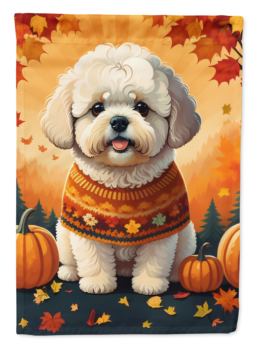 Fall garden flag close-up: white bichon frise in orange sweater with pumpkins and leaves