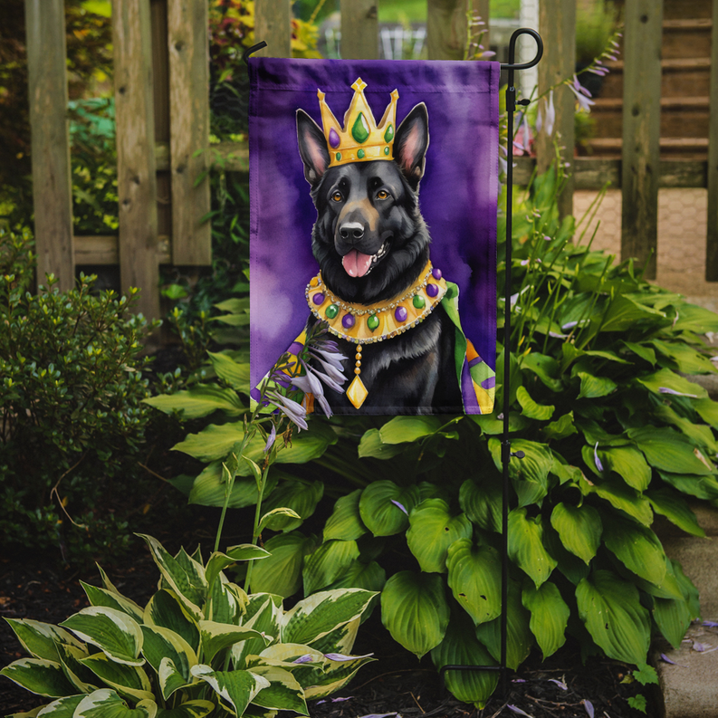 Garden flag on yard stake with crowned black German shepherd and Mardi Gras beads