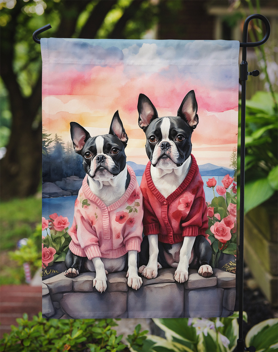 Boston terrier garden flag on outdoor stake, two dogs in sweaters with floral flowers
