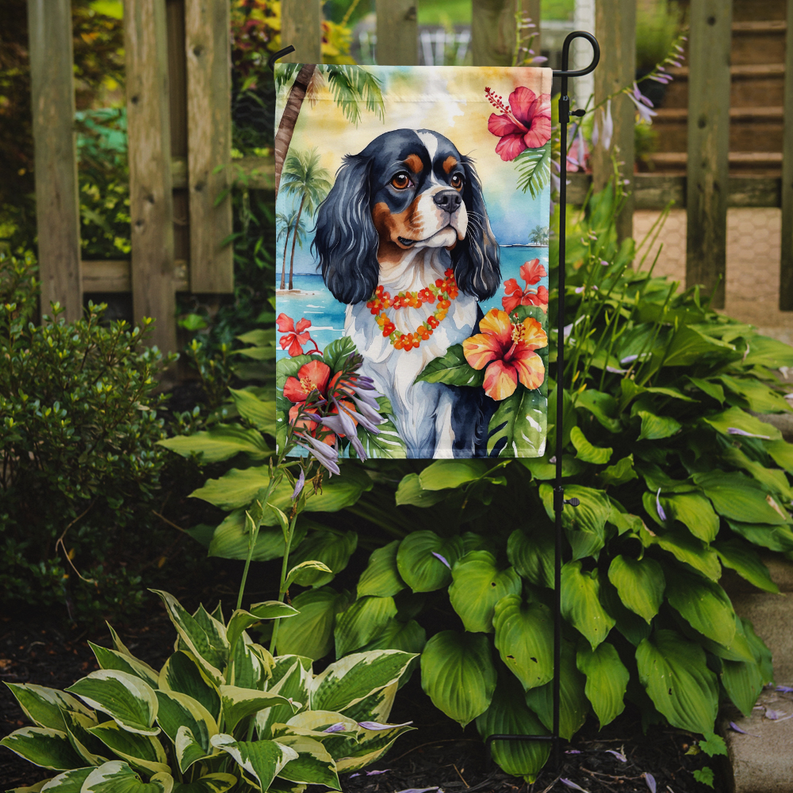 Luau garden flag on outdoor stand with blue-and-white spaniel and tropical flowers