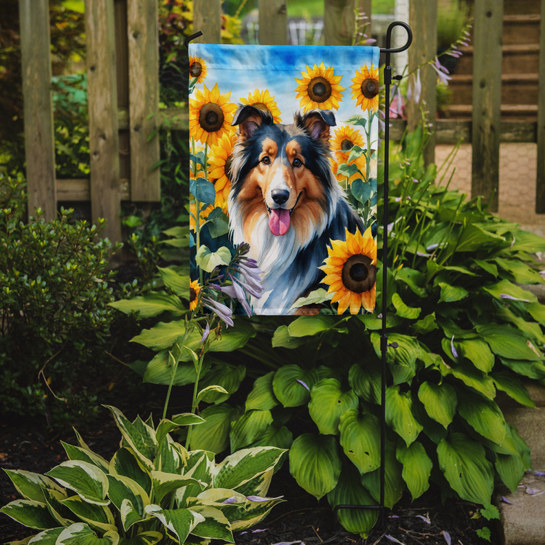 Garden flag with two collie dogs and bright sunflowers, hung on a stake