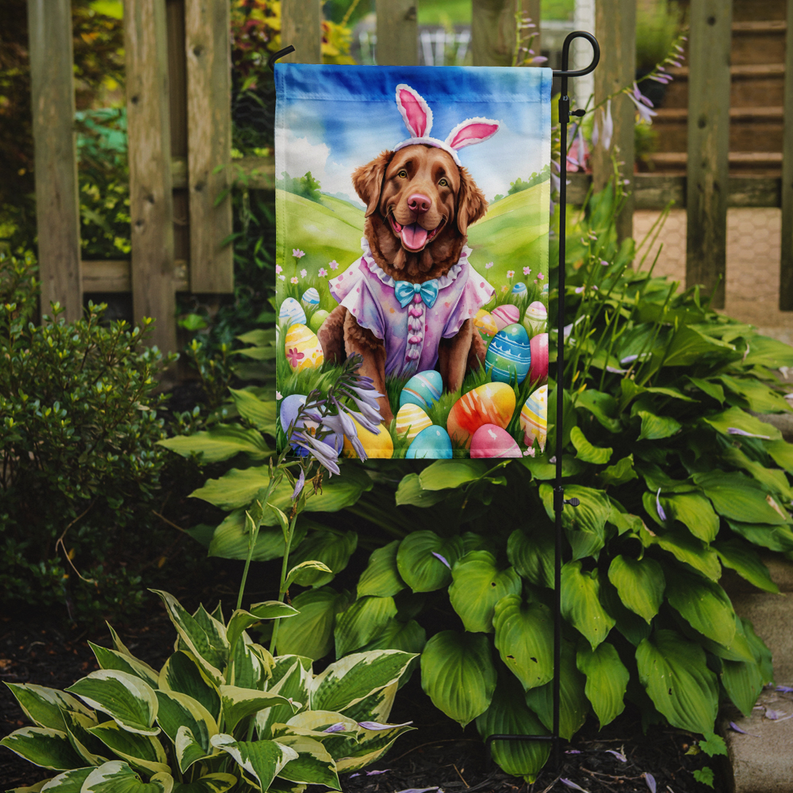 Easter garden flag on outdoor pole with dog in easter egg garden scene