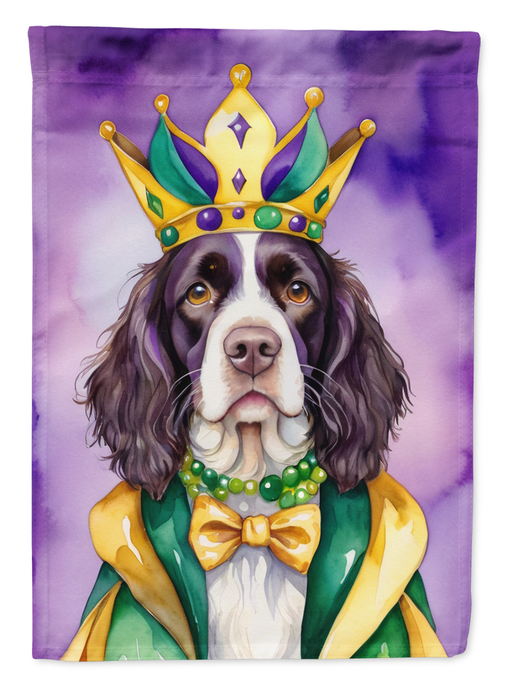 Close-up purple garden flag with crowned English Springer Spaniel face and bow