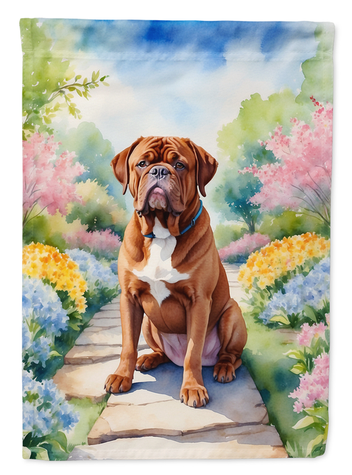 Garden flag featuring brown and white dog on floral garden path
