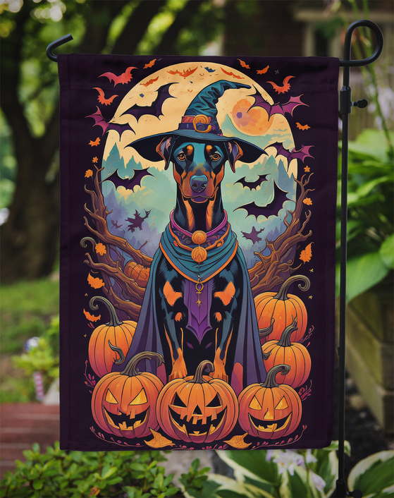 Doberman witch Halloween garden flag on yard stake with pumpkins and crescent moon scene