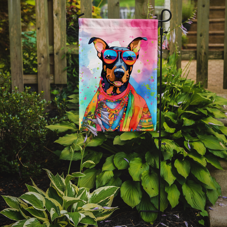 Hanging Doberman dog garden flag on yard pole with neon sunglasses and beads