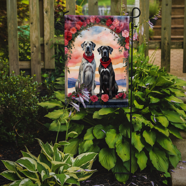 Garden flag featuring two Great Danes in red bandanas with flower frame on stake