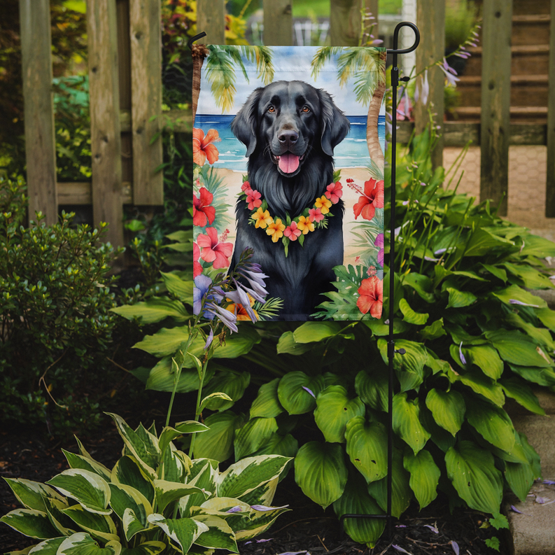 Luau garden flag outdoors on a metal stake, showing a black retriever and floral lei