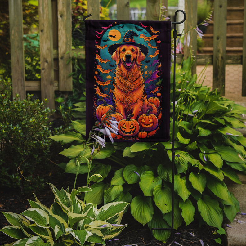 Halloween garden flag featuring a golden retriever witch, pumpkins, and bats in outdoor garden
