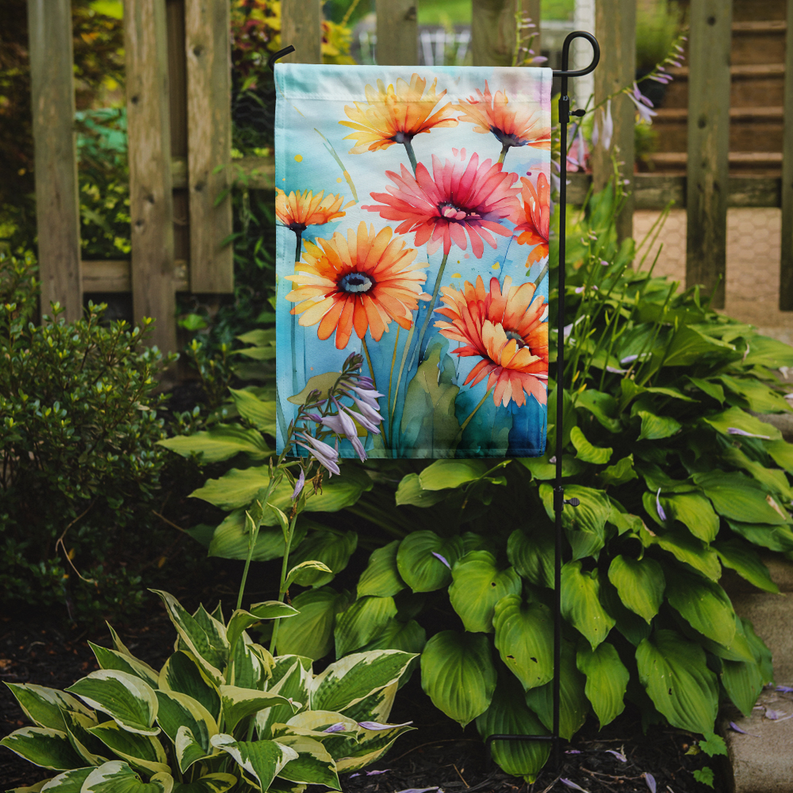 Gerbera daisy garden flag on a metal stand with watercolor orange and pink flowers