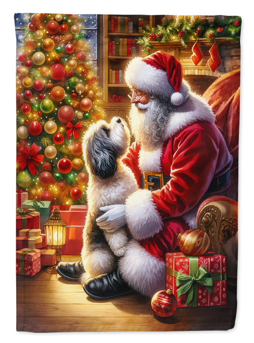 Santa Claus in red and white holding a Havanese dog on a festive holiday garden flag
