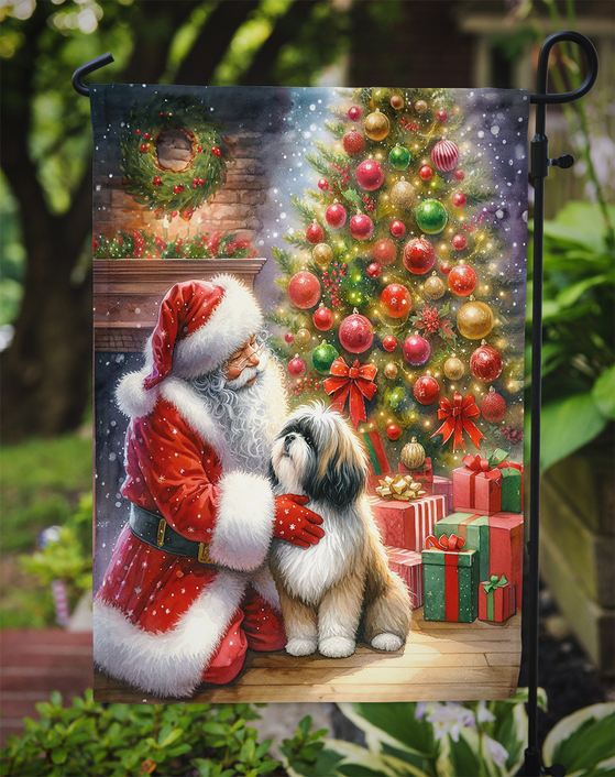Christmas garden flag showing Santa, Lhasa Apso dog, and decorated tree