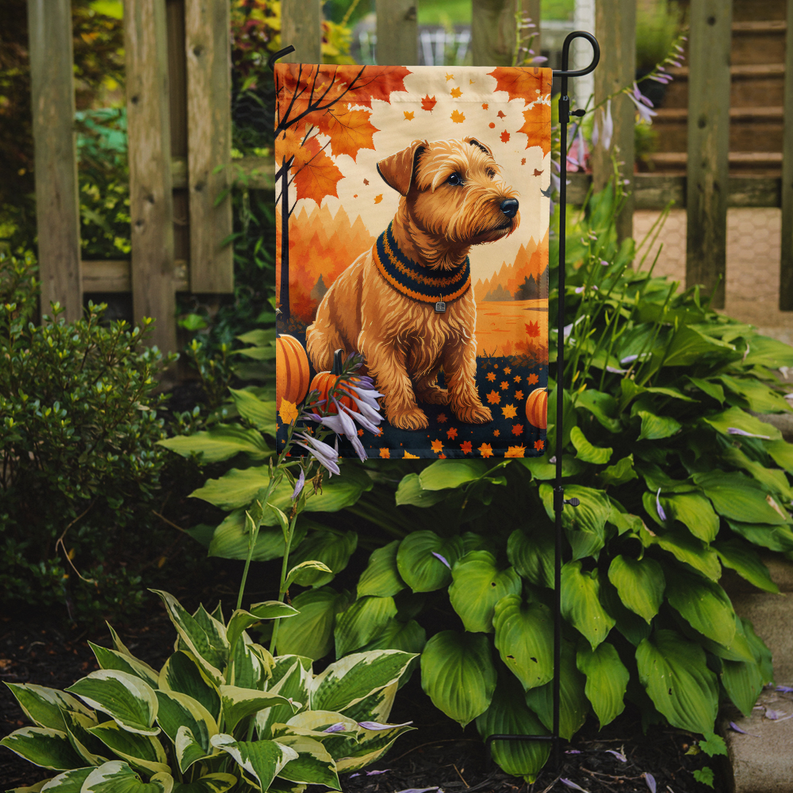 Lakeland terrier fall garden flag on a metal stand with pumpkins and autumn leaves