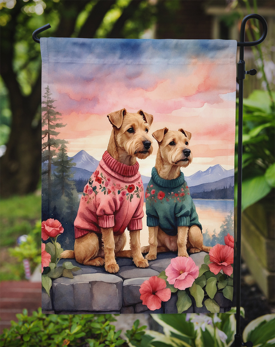 Two-heart garden flag featuring two Lakeland terriers in sweaters with pink flowers