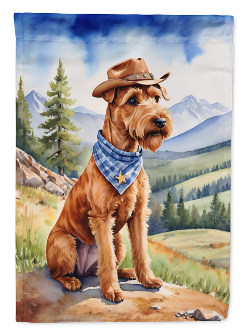 Garden flag close-up of terrier in cowboy hat with blue sky and mountains