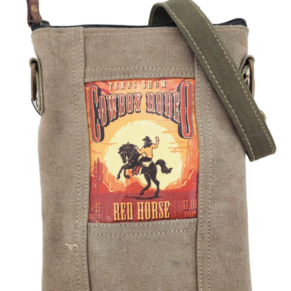 Small recycled tent crossbody bag with cowboy graphic patch and adjustable green strap