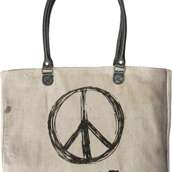 Earthtone canvas tote bag with black peace sign graphic and leather-look handles